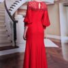 red evening gown with net shoulders