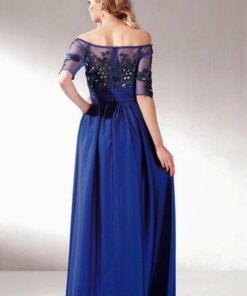 Blue embroidered evening dress by Darius Cordell