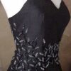 embroidered side of black evening dresss from Darius Cordell