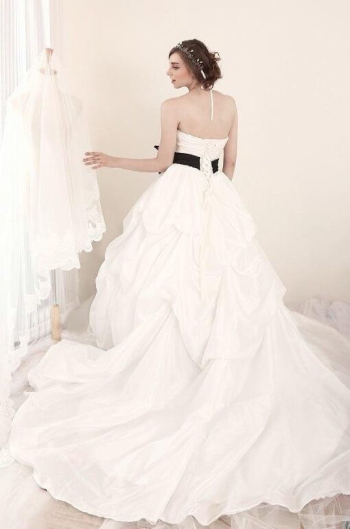 White backless wedding dress from Darius Cordell