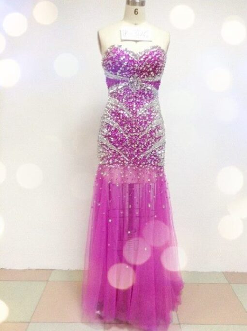 Heavily beaded fuchsia colored pageant dresses