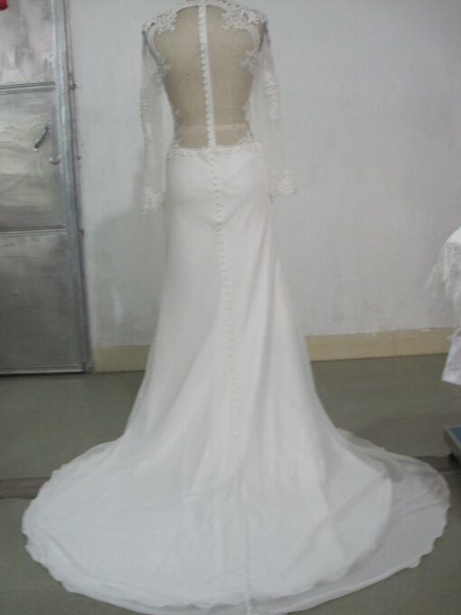 Gorgeous Backless net white bridal dress at Darius Cordell