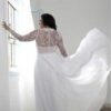 back of a Sheer Long Sleeve Plus Size Lace Bridal Gown by Darius Cordell