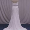 back of a plus size wedding dress that is ruched