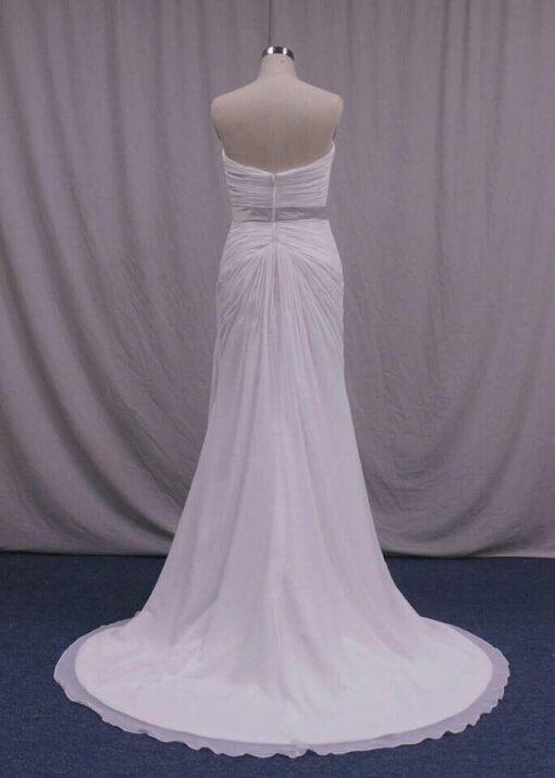 back of a plus size wedding dress that is ruched