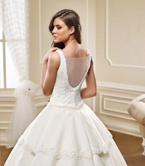 wedding dress with sheer back and ball gown skirt