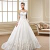 Sheer long sleeve lace wedding gown with ball gown skirt