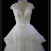 Darius Cordell close peplum style cap sleeve wedding gown