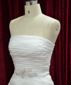 strapless ruched wedding gown with tiered ball gown skirt