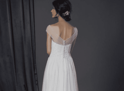 back of sheer off shoulder bridal dress