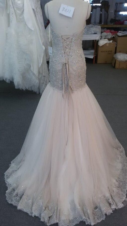 Style  lace up back beaded lace wedding gown with fit and flare style from Darius Cordell