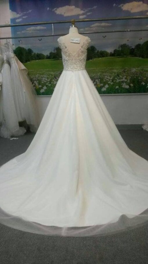 Style#FA IMPOpenbackweddingdresswithcapsleevesfromDariusCordellCoutureFashionDesigns