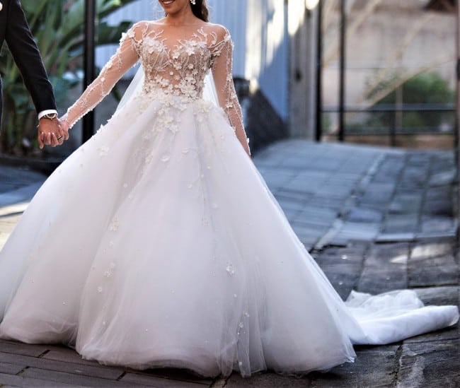 Sheer long sleeve ball gown wedding dress