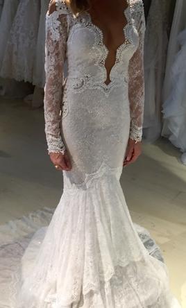 ivory mermaid wedding dress with long sleeves from Darius bridal