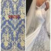 Darius Bridal has replicas of lace similar to a couture wedding gown