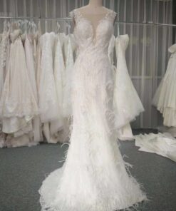 NO.1975 cap sleeve illusion neckline feather wedding dress from Darius Cordell