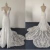 Style QM001 - Sleeveless deep v-neck lace wedding gown from Darius Cordell Fashion