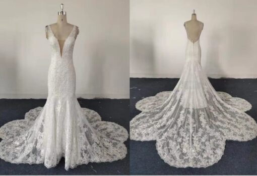 Style QM001 - Sleeveless deep v-neck lace wedding gown from Darius Cordell Fashion