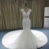 JB1238-325 Fitted wedding dresses with feathers from Darius Cordell